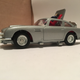 The model features a push out bumper, machine guns, ejector seat, bullet screen, and rotating license plates.